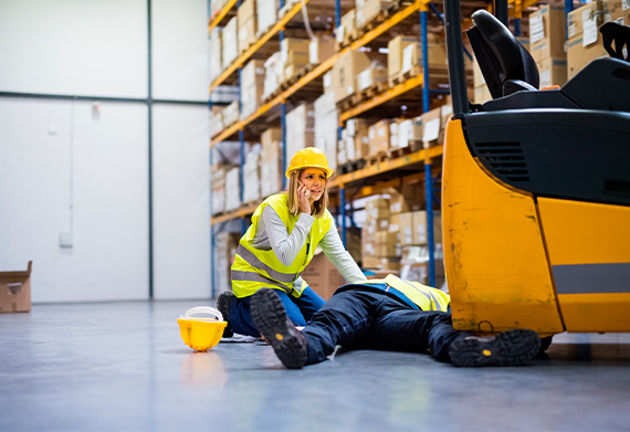 workplace injury worker on floor