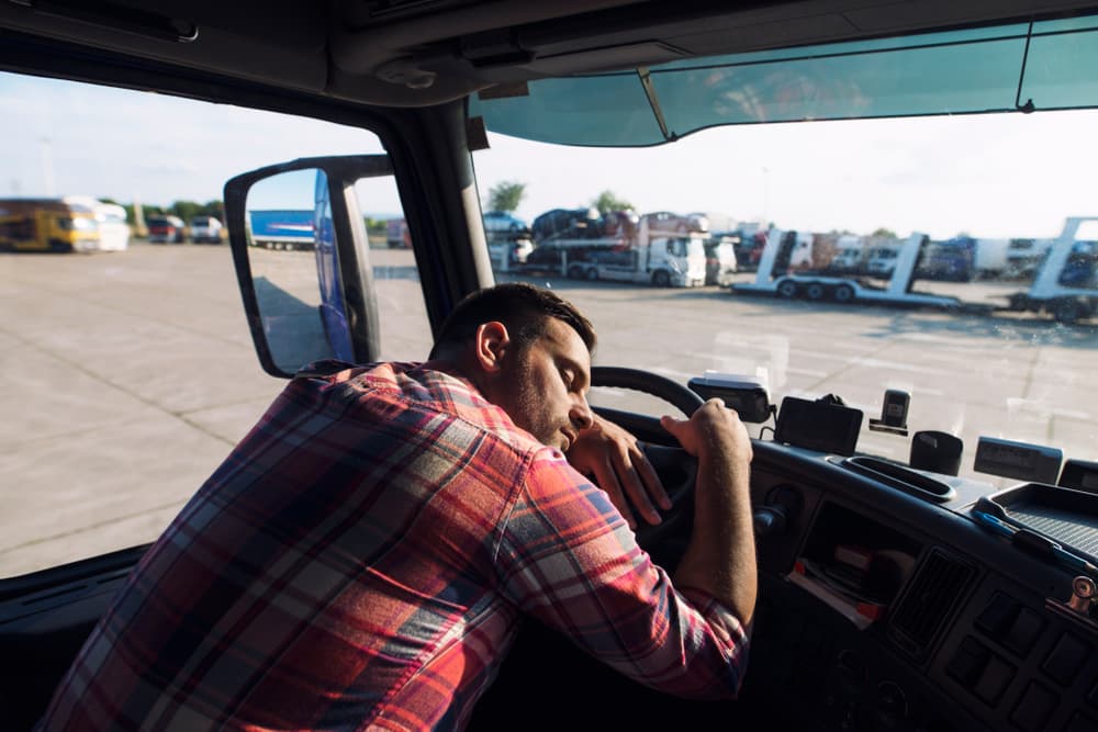 Truck drive asleep in truck