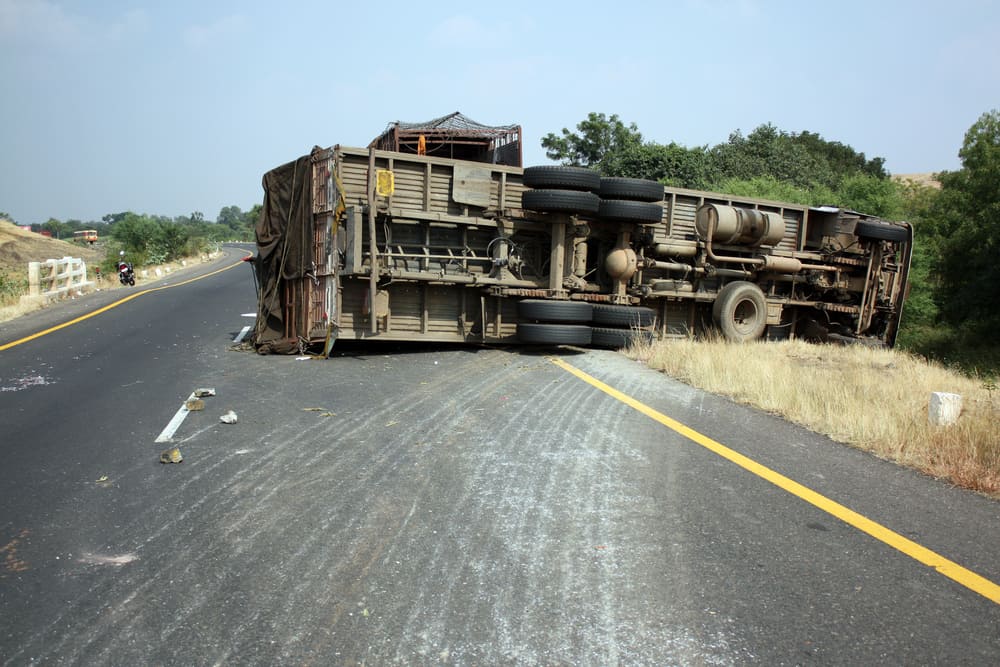 Overturned truck on road