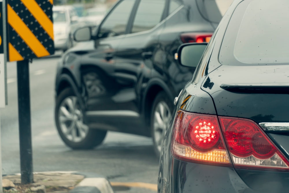 car making U-turn at intersection