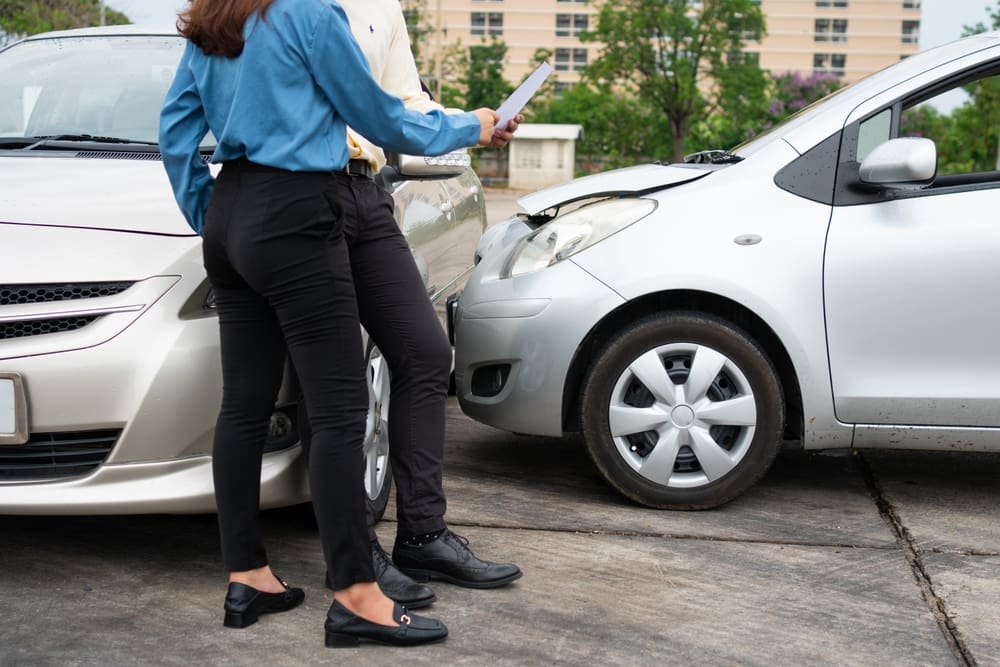 woman Argues with Insurance Company After Car Accident